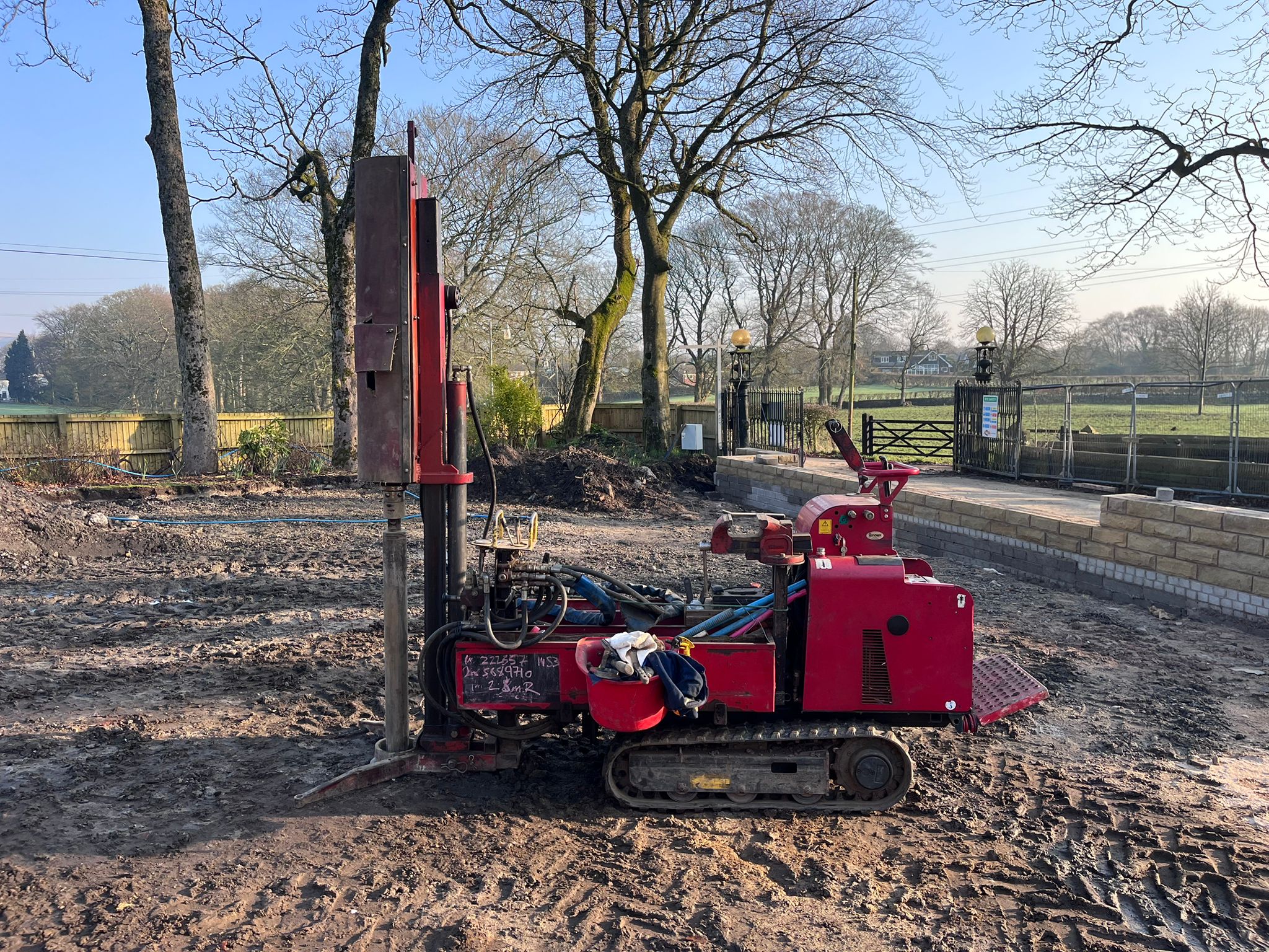 Track-mounted drilling rig on site for a Phase 2 ground investigation